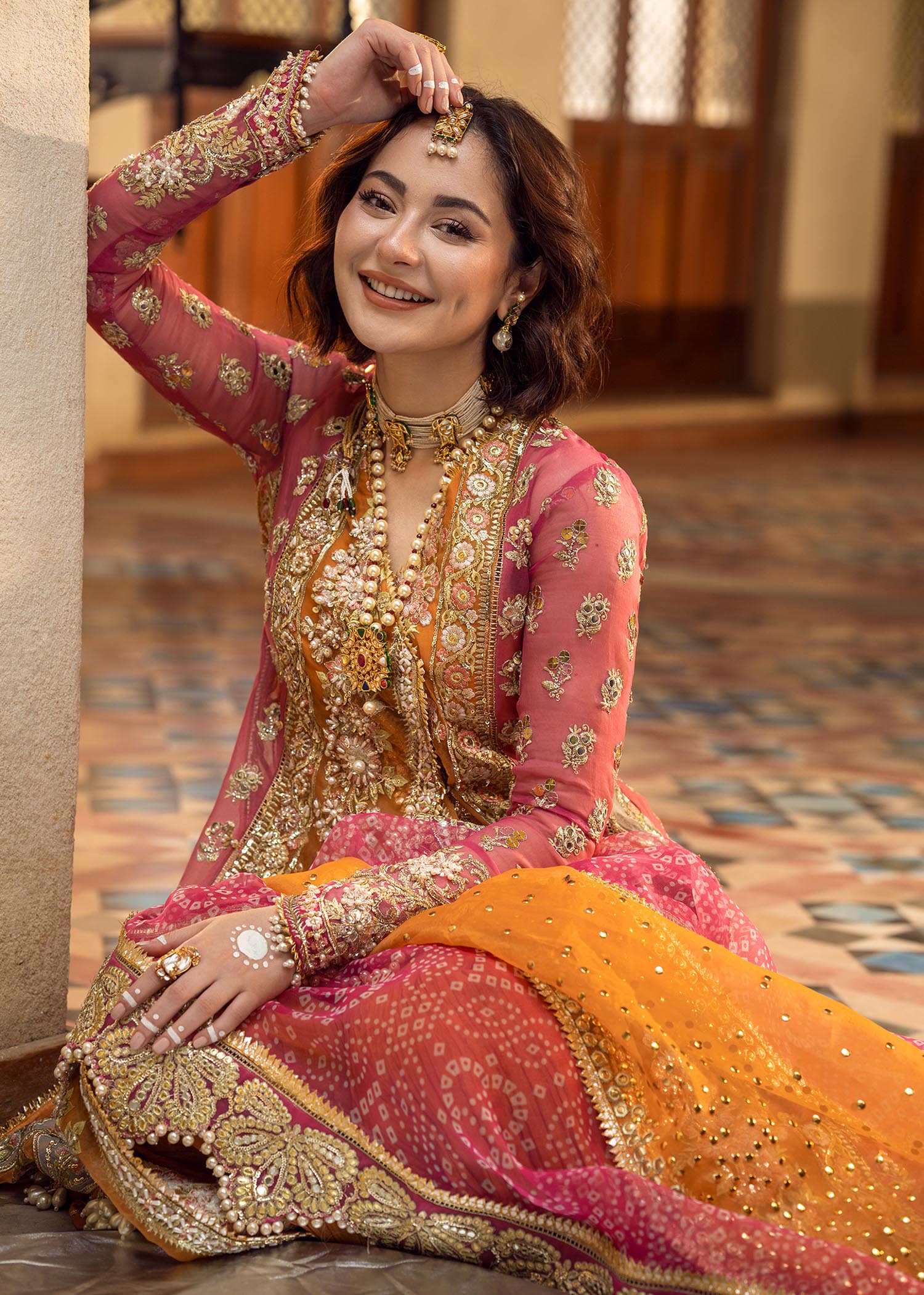 new mehndi dress design Yellow Mehndi Dress in Bridal Angrakha Frock Style is an epitome of tradition and royalty that wins everyone's hearts at the very first glance. The lavish dabka and mirror work details make